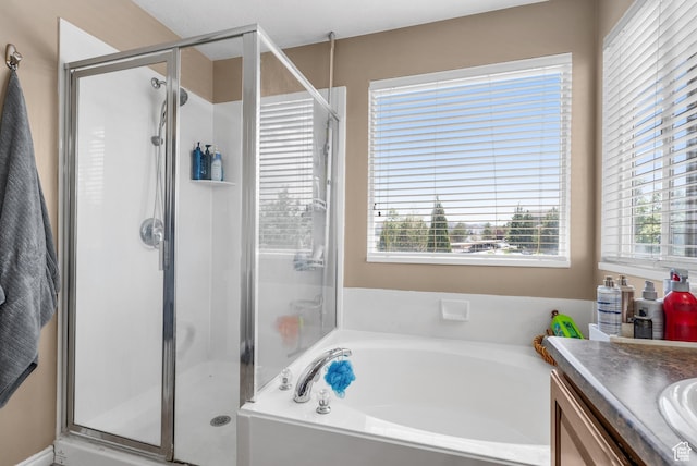 5453 W Mayflower St, West Jordan, UT 84081 - full bath featuring a garden tub, a shower stall, and vanity