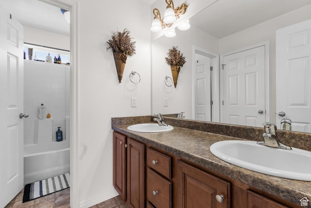 5453 W Mayflower St, West Jordan, UT 84081 - bathroom with double vanity and shower / tub combination