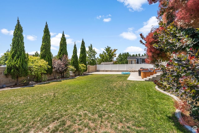 5453 W Mayflower St, West Jordan, UT 84081 - fenced backyard with a patio area