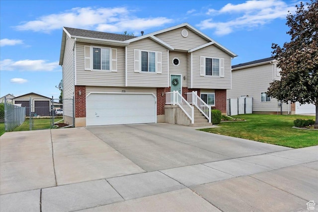 771 N 1725 W, Clinton, UT 84015 - split foyer home with an attached garage, brick siding, and concrete driveway