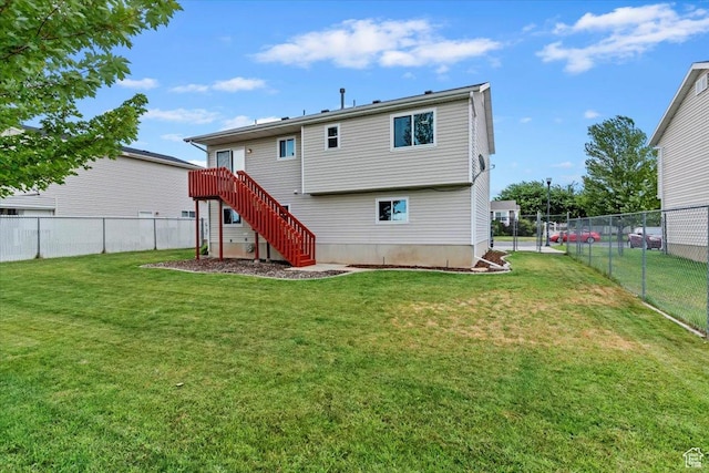 771 N 1725 W, Clinton, UT 84015 - back of house featuring stairs and a fenced backyard