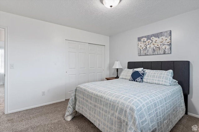 771 N 1725 W, Clinton, UT 84015 - carpeted bedroom featuring a closet and a textured ceiling