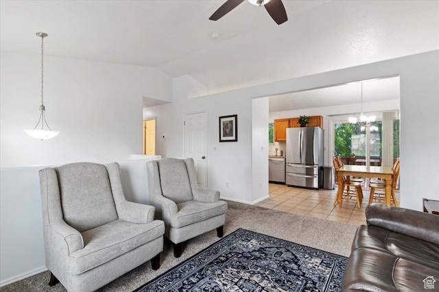 771 N 1725 W, Clinton, UT 84015 - living room with a ceiling fan, vaulted ceiling, a chandelier, light tile patterned floors, and light carpet
