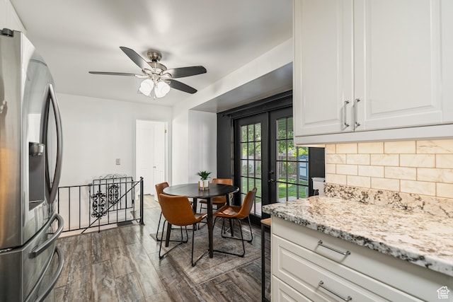 174 W Dawson St, Layton, UT 84041 - kitchen with stainless steel fridge, decorative backsplash, white cabinetry, dark wood-type flooring, and a ceiling fan