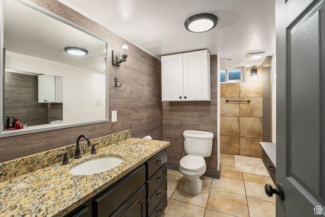174 W Dawson St, Layton, UT 84041 - full bathroom featuring vanity, tile patterned flooring, and a tile shower