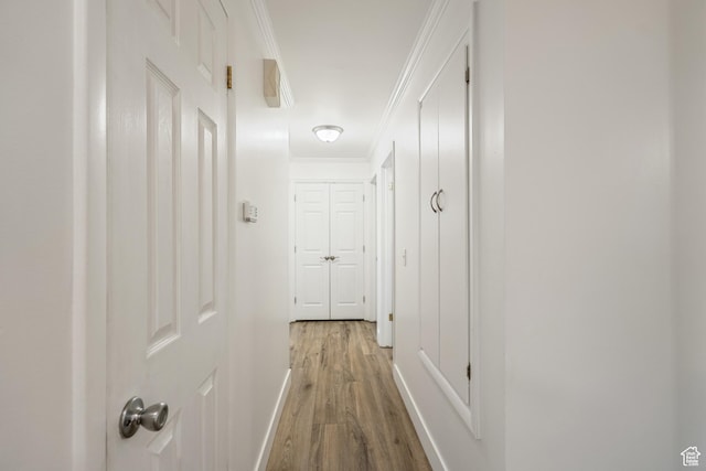 174 W Dawson St, Layton, UT 84041 - corridor with light wood finished floors and crown molding