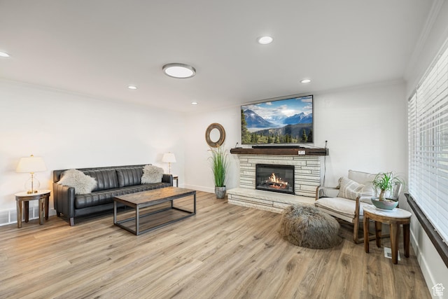174 W Dawson St, Layton, UT 84041 - living room with ornamental molding, a fireplace, wood finished floors, and recessed lighting