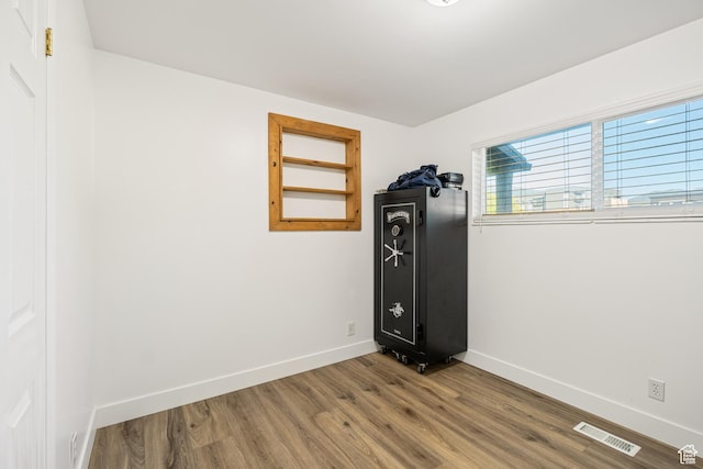 174 W Dawson St, Layton, UT 84041 - empty room with baseboards and wood finished floors