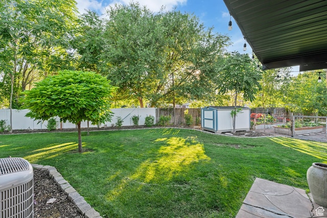 174 W Dawson St, Layton, UT 84041 - fenced backyard with a garden and a storage shed