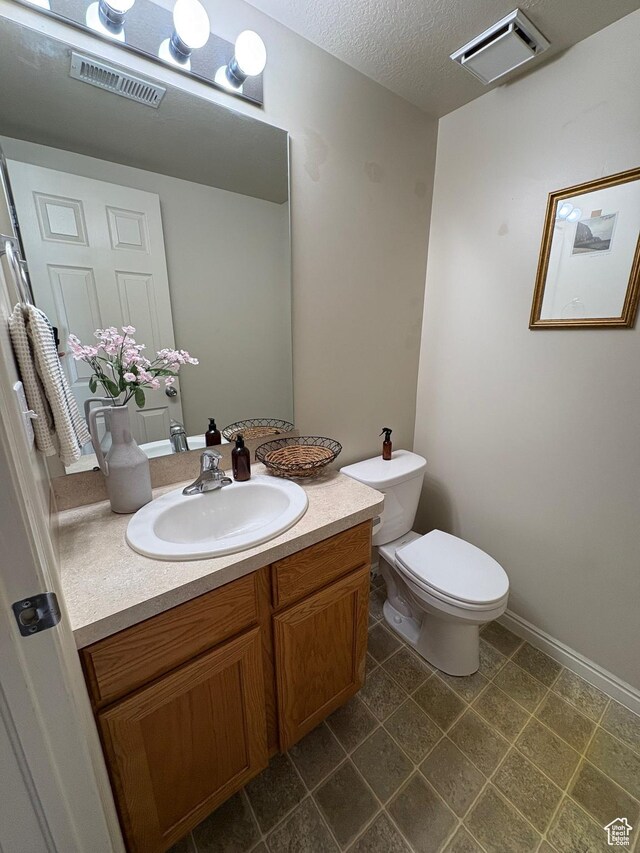 2896 W 3965 S Unit 86, West Haven, UT 84401 - bathroom featuring vanity and a textured ceiling