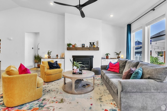 2456 W Maple St, Mapleton, UT 84664 - living room featuring a ceiling fan, a glass covered fireplace, recessed lighting, and vaulted ceiling