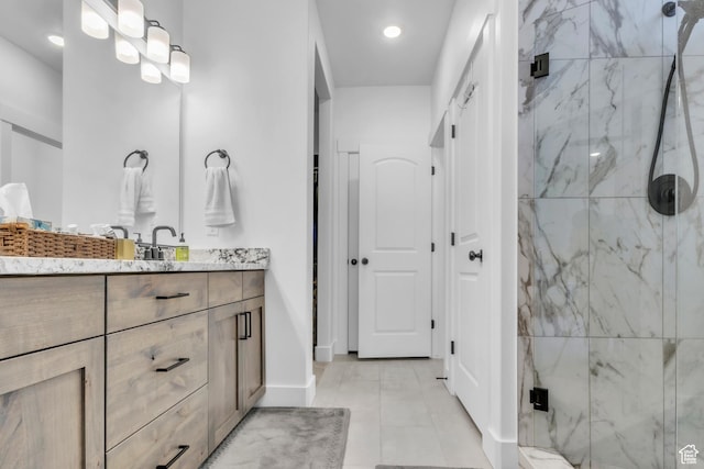 2456 W Maple St, Mapleton, UT 84664 - full bath featuring a marble finish shower, vanity, recessed lighting, and tile patterned floors