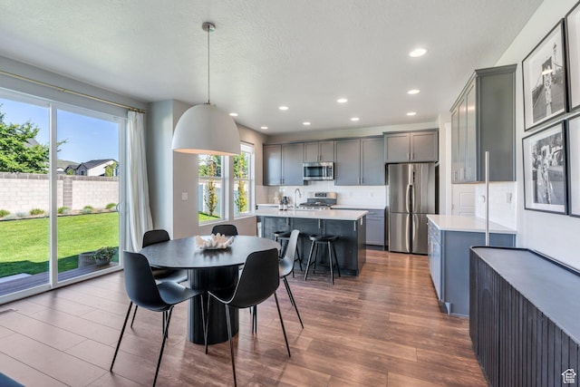 2739 N 3550 W, Lehi, UT 84043 - dining area with dark wood-type flooring, recessed lighting, and a textured ceiling