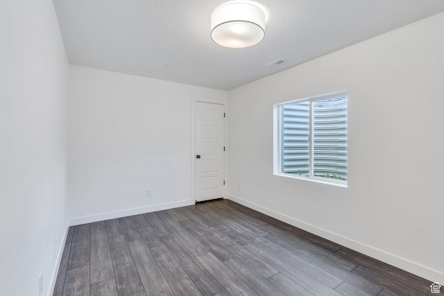 2739 N 3550 W, Lehi, UT 84043 - unfurnished room featuring dark wood-style flooring and baseboards