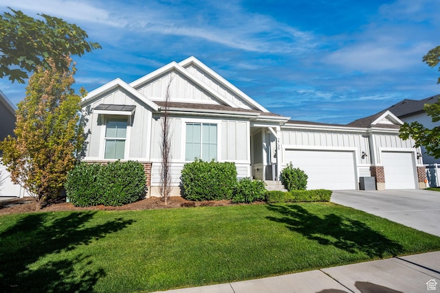 2739 N 3550 W, Lehi, UT 84043 - view of front of property featuring board and batten siding, a garage, a front yard, and concrete driveway