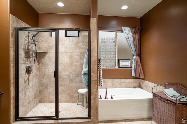 960 N Catalpa Dr, Washington, UT 84780 - bathroom with a garden tub, a shower stall, tile patterned floors, and recessed lighting
