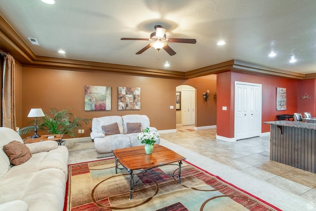 960 N Catalpa Dr, Washington, UT 84780 - living room featuring arched walkways, ceiling fan, recessed lighting, a raised ceiling, and light tile patterned floors