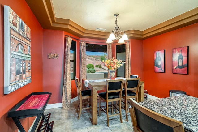 960 N Catalpa Dr, Washington, UT 84780 - dining room featuring a chandelier and a tray ceiling