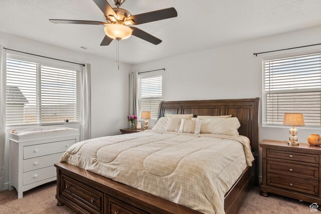 1546 W Parkview Dr, Syracuse, UT 84075 - bedroom with light colored carpet and a ceiling fan