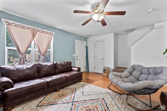 3364 E Dornock Dr, Eagle Mountain, UT 84005 - living room featuring a ceiling fan and wood finished floors