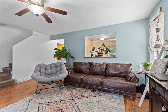 3364 E Dornock Dr, Eagle Mountain, UT 84005 - living room with wood finished floors, stairs, and a ceiling fan