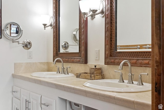1582 Deer Valley Dr N, Park City, UT 84060 - bathroom featuring double vanity and decorative backsplash