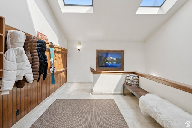 1582 Deer Valley Dr N, Park City, UT 84060 - interior space featuring a skylight, vaulted ceiling, and light tile patterned flooring