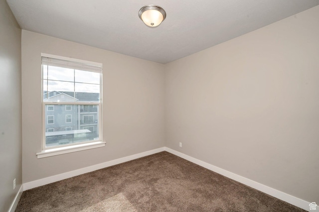 1128 S 820 E Unit 1303, Heber City, UT 84032 - unfurnished room with dark colored carpet and baseboards