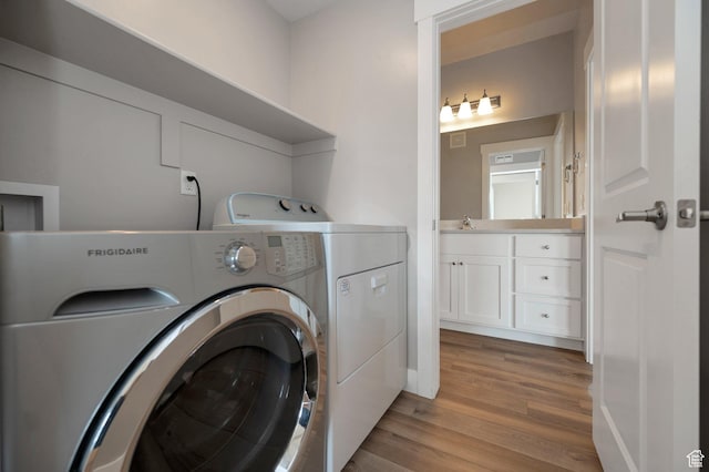 1128 S 820 E Unit 1303, Heber City, UT 84032 - laundry area featuring independent washer and dryer and light wood-type flooring