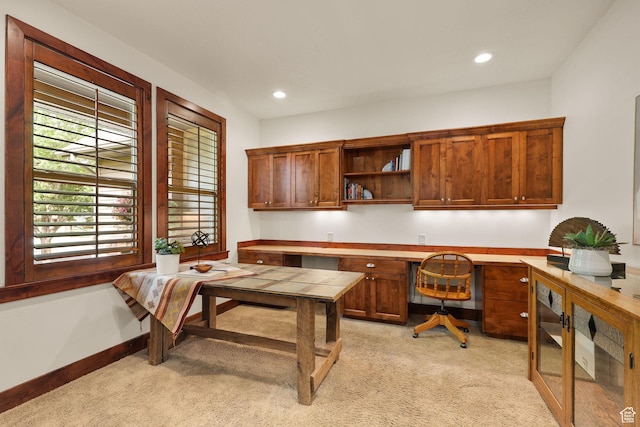 4048 W Ivy Ave, Mountain Green, UT 84050 - office with light colored carpet, built in desk, and recessed lighting
