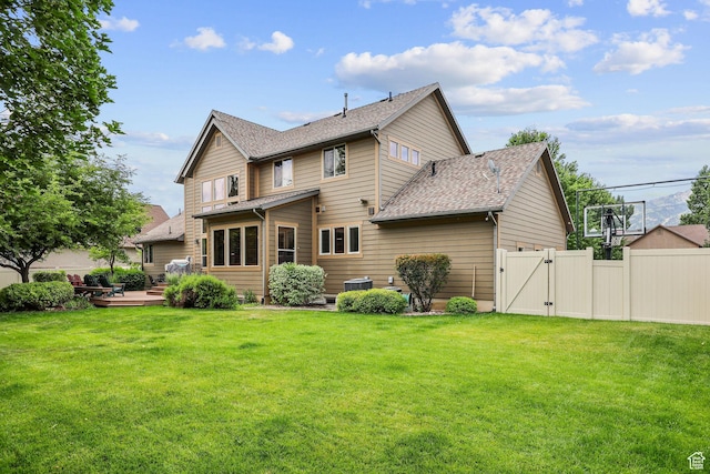 4048 W Ivy Ave, Mountain Green, UT 84050 - rear view of property with a gate, a wooden deck, and roof with shingles