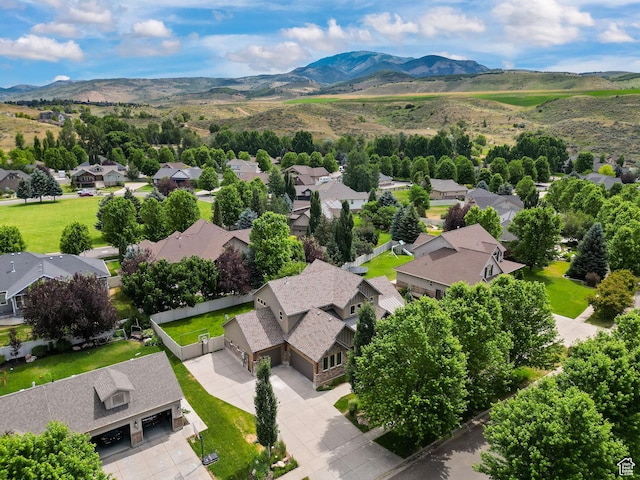 4048 W Ivy Ave, Mountain Green, UT 84050 - aerial perspective of suburban area with a mountain backdrop