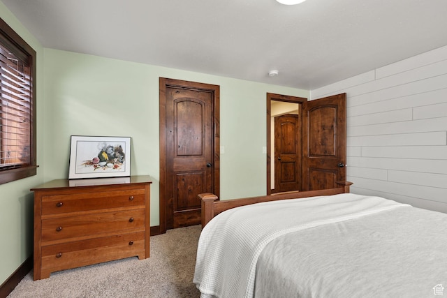 4048 W Ivy Ave, Mountain Green, UT 84050 - bedroom with carpet and wood walls