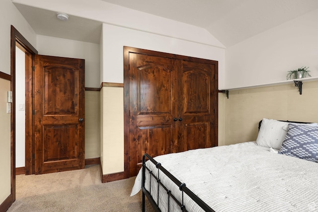 4048 W Ivy Ave, Mountain Green, UT 84050 - carpeted bedroom featuring a closet and lofted ceiling