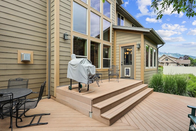 4048 W Ivy Ave, Mountain Green, UT 84050 - deck with outdoor dining space, grilling area, and a mountain view