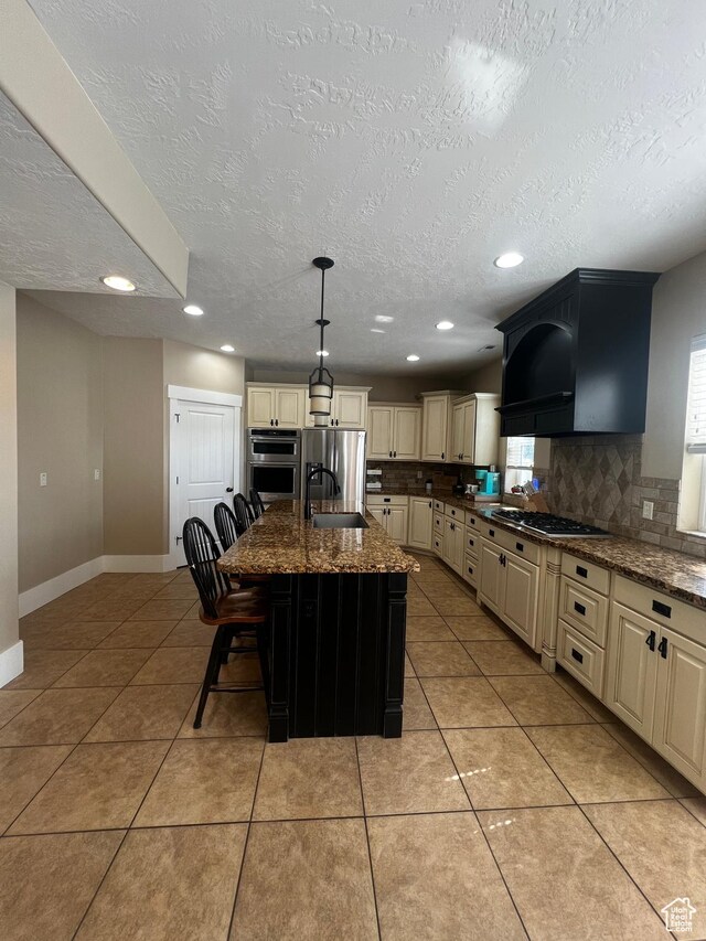 1694 S 710 E, Lehi, UT 84043 - kitchen featuring cream cabinetry, extractor fan, backsplash, appliances with stainless steel finishes, and a textured ceiling