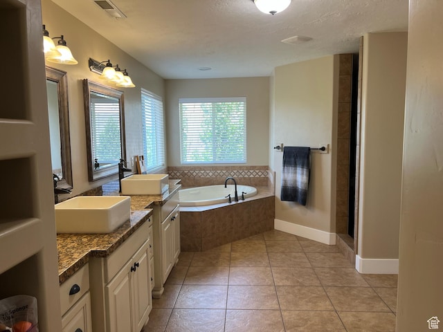 1694 S 710 E, Lehi, UT 84043 - bathroom featuring a garden tub, vanity, tile patterned flooring, and a shower