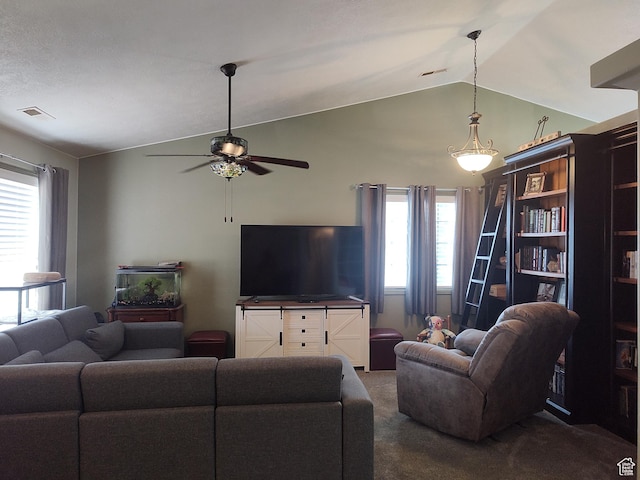 2054 E 140 S, St George, UT 84790 - living room with vaulted ceiling, dark carpet, and a ceiling fan