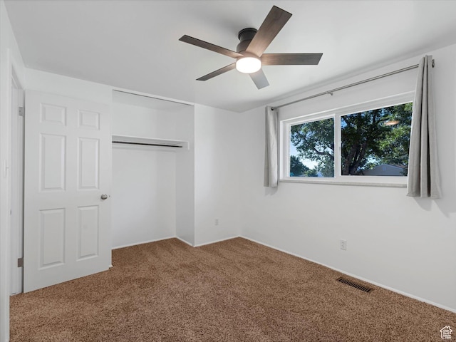 7645 W Gardenia Ave, Magna, UT 84044 - unfurnished bedroom featuring carpet, a closet, and ceiling fan