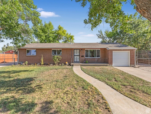 7645 W Gardenia Ave, Magna, UT 84044 - ranch-style house with a garage, driveway, and brick siding