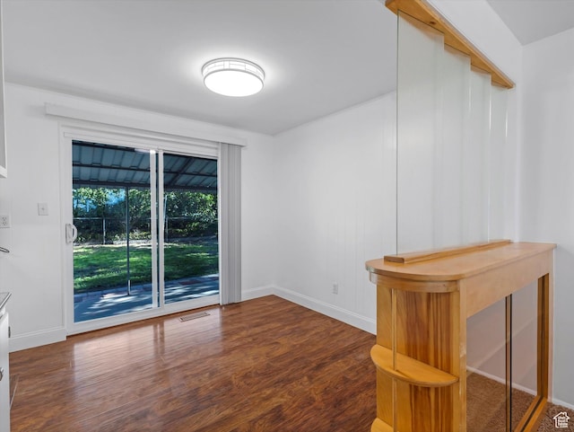 7645 W Gardenia Ave, Magna, UT 84044 - empty room with wood finished floors and baseboards