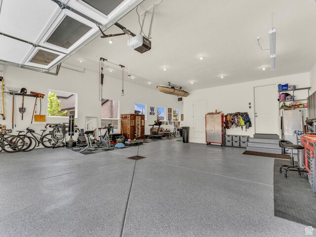 943 Hart Loop, Francis, UT 84036 - garage featuring a garage door opener and recessed lighting