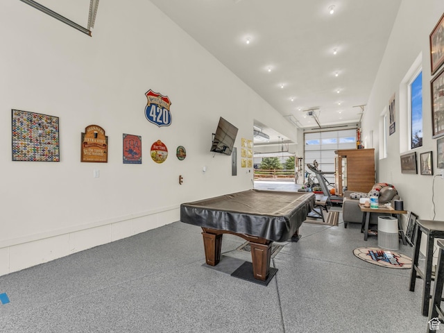 943 Hart Loop, Francis, UT 84036 - playroom featuring speckled floor, billiards, and a garage