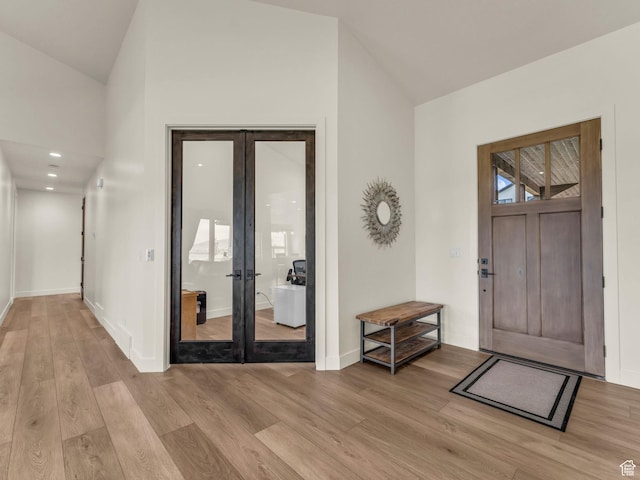 943 Hart Loop, Francis, UT 84036 - entrance foyer with french doors, lofted ceiling, and light wood-type flooring