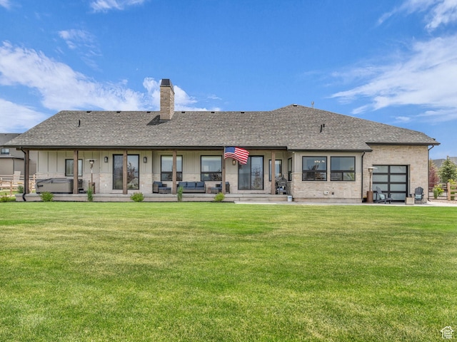 943 Hart Loop, Francis, UT 84036 - rear view of property with a chimney, roof with shingles, a yard, and an attached garage