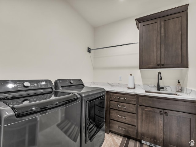 943 Hart Loop, Francis, UT 84036 - washroom featuring separate washer and dryer and cabinet space
