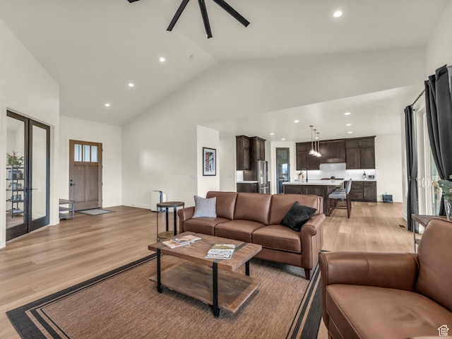 943 Hart Loop, Francis, UT 84036 - living area featuring light wood-style flooring, high vaulted ceiling, recessed lighting, and a ceiling fan