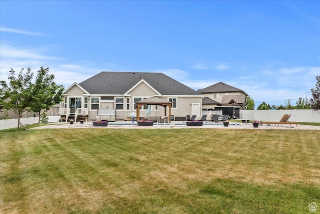 1820 W 950 N, Layton, UT 84041 - back of property featuring a gazebo, a fenced backyard, an outdoor hangout area, a patio, and a shingled roof