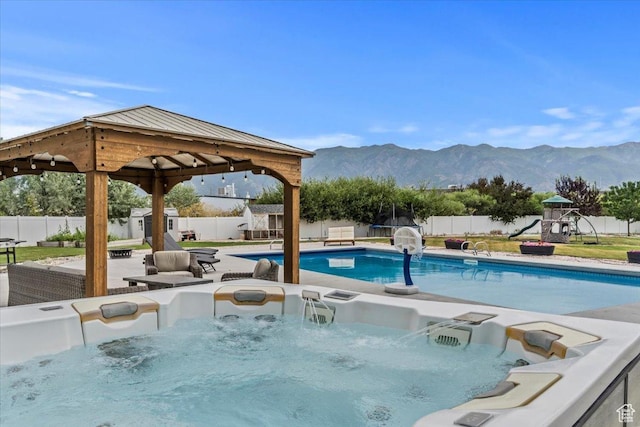 1820 W 950 N, Layton, UT 84041 - view of pool featuring a fenced backyard, a hot tub, and a mountain view