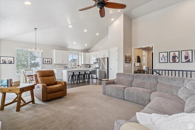 1820 W 950 N, Layton, UT 84041 - living room featuring a ceiling fan, high vaulted ceiling, a chandelier, and recessed lighting
